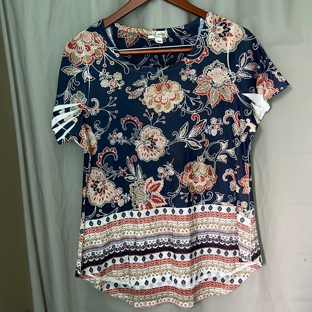 World Unity X woman’s top, interesting designs